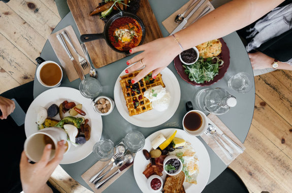 restaurant table full of food