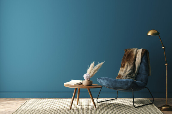 Home interior mock-up with dark green armchair, table and decor in living room, 3d render