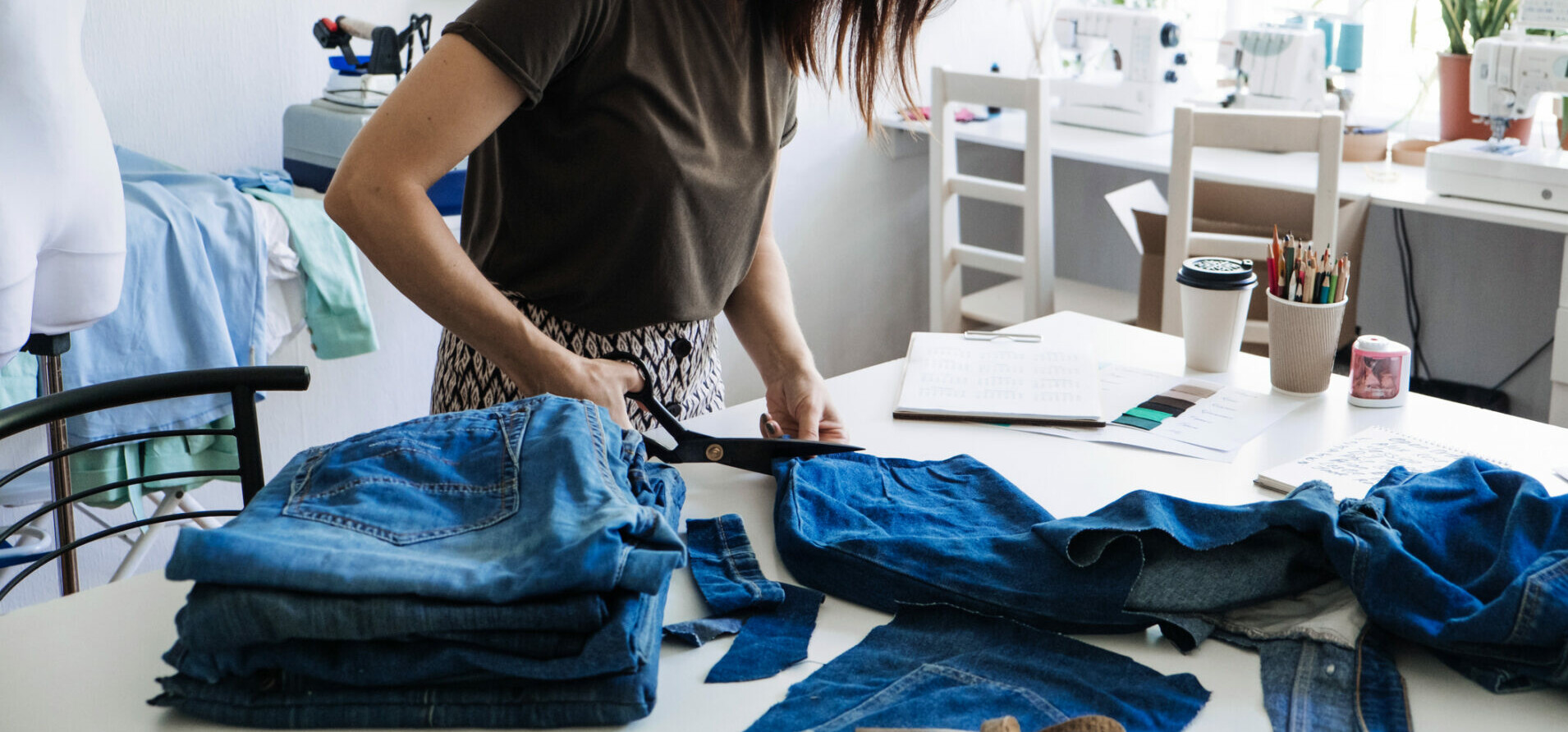 sewing and cutting jeans